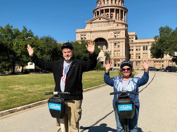 Madeline and Paul Kay, Hands Raised, Segway Tour, Texas Capitol, Austin, Texas