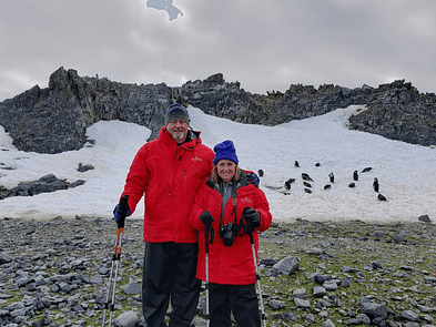 Madeline and Paul with Chinstrap Penguins, Antarctica