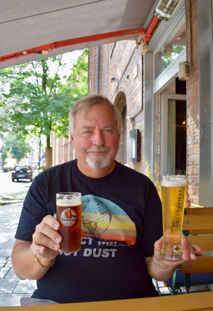 Paul Holding Two Beers, Dusseldorf, Germany
